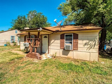 Single story home with a front yard