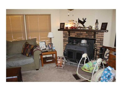 Living Room. keep warm all winter w/wood burning fireplace