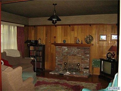 Family Room w/wood burning fireplace