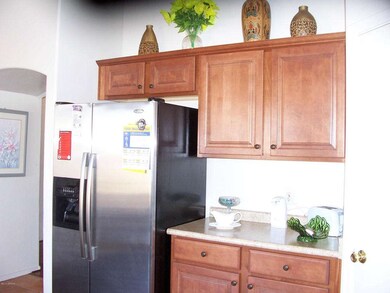 kitchen has double door refrigerator