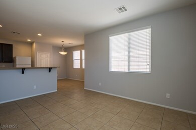 7706 Ornamento Way, Las Vegas, NV 89179 - photo 3