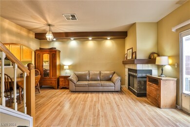 Great Room with Ceiling Fan, Track Lighting, Two W