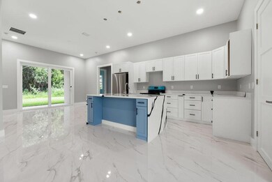 660 NE Moss Rose Place, Port St. Lucie, FL 34983 - photo 3