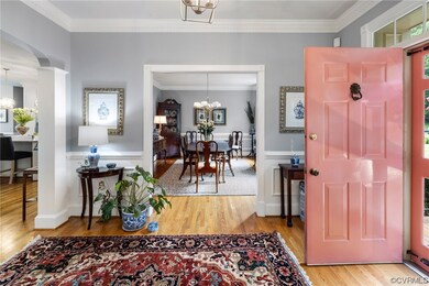 Formal entry foyer, wood floors, crown molding