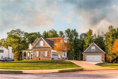 View of front of property featuring concrete drive
