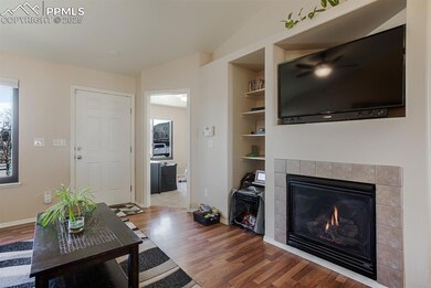 Living area featuring built in features, a wealth 