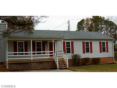 Exterior Front - Vinyl siding, replacement windows