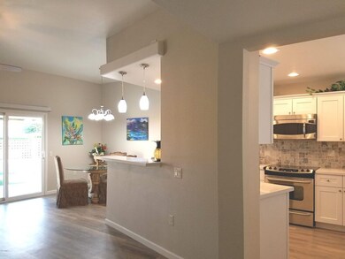 Kitchen Opens to Living Rm