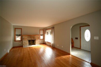 LARGE LIVING ROOM WITH WOODBURNING FIREPLACE