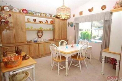 Dining area offers full wall of cabinetry.