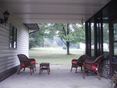 COVERED PATIO BETWEEN SUNROOM AND WORKSHOP