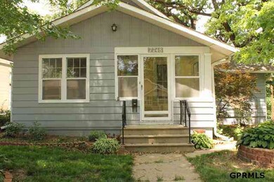 The front of this house has an adorable little porch entry that is so welcoming into the house.