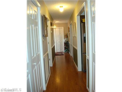 Interior Space/Layout. Showing the hall way w/hardwood floors