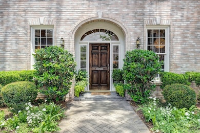 Arched front door greets your guests!