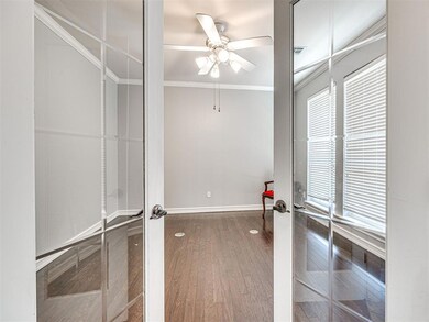 Empty room featuring ornamental molding, french do