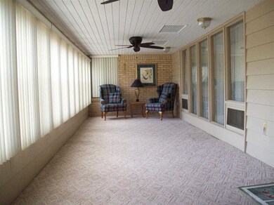 Wonderful 10 x 36 sunroom. Beautiful windows.