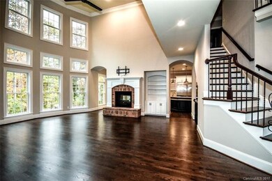 A souring wall of windows create a dramatic beauty