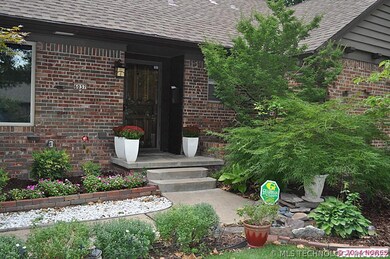 Professionally landscaped front porch area