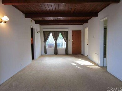 View of Living Room and Dining Area from Front Ent