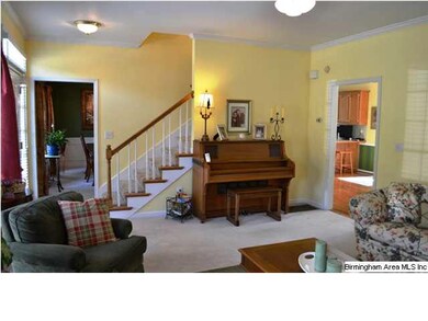Another view of the sunny living room!  You will l