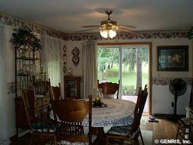 Dining Room Sliding glass door exits onto the deck