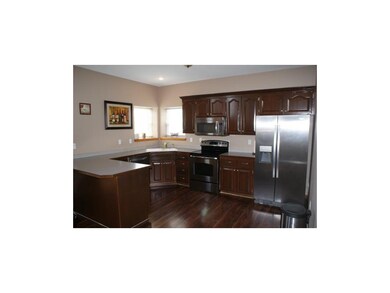 Breakfast peninsula and wood floors