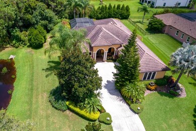 Bird's eye view of home and lot