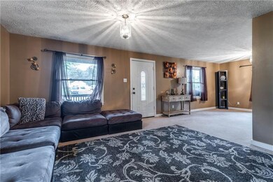Front of living room. Great space with den attache