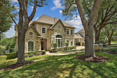 This stunning home is tucked away on a generous greenbelt lot in the highly coveted community of Steiner Ranch.