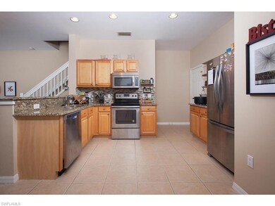 Kitchen with tasteful granite and stainless steel appliances. Not pictured are breakfast dining area and powder room off the kitchen.