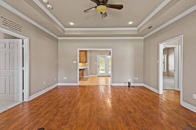 Unfurnished bedroom featuring wood-type flooring, 