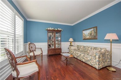 Custom shutters and wood floors compliment the Liv