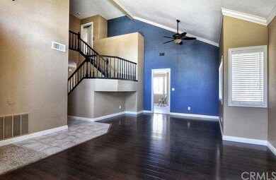 Living & dining areas. This room offers soaring ce