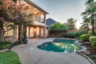 Gorgeous pool with covered patio downstairs and ba