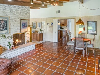 Double sided fireplace between the living and family room!