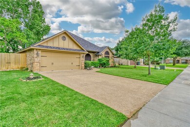 Ranch-style house featuring board and batten sidin