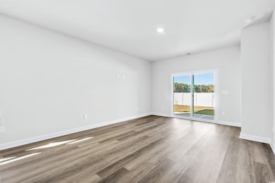 Unfurnished room featuring light hardwood / wood-s