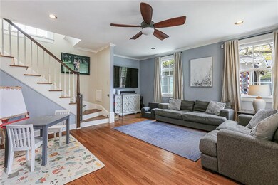 Den view with stairs