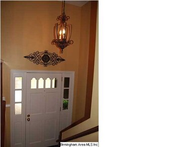 LOVELY SPLIT FOYER WITH 16 FT HIGH CEILING