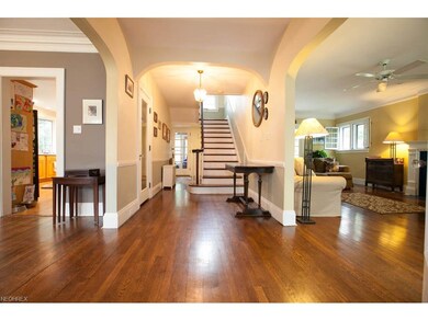 Wonderful open foyer with gleaming hardwood floors