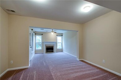 610 Huffine has a huge recreation room with a fireplace, half bath, laundry room, and a back door.  And all that is just on the bottom floor of this 3 story town home!