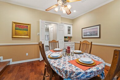 formal dinning room, wood floors, chair railing, c