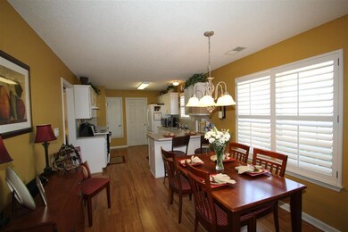 Charming breakfast area is the perfect spot to enj
