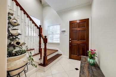 Beautiful light & airy entry with travertine floor