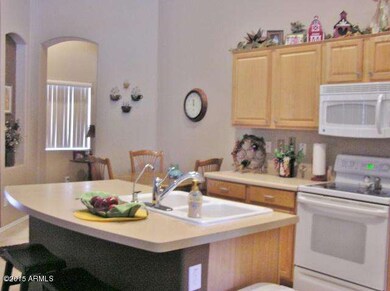 KITCHEN LOOKING TO EATING AREA