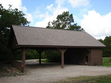 Detached carport with circular drive for easy comi