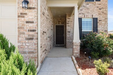 Foyer featuring french doors and dark wood-style flooring