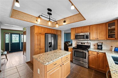 Kitchen with appliances with stainless steel finis