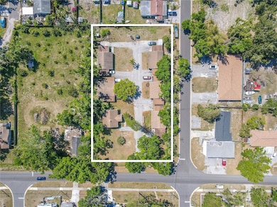 The property includes five duplexes—with a mix of studio and 1-bedroom units, each featuring a screened-in front porch—plus a separate 2-bedroom single-family home.
