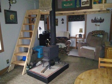 Living room and loft stairs
